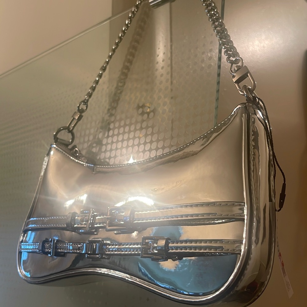 Aldo silver patent clutch